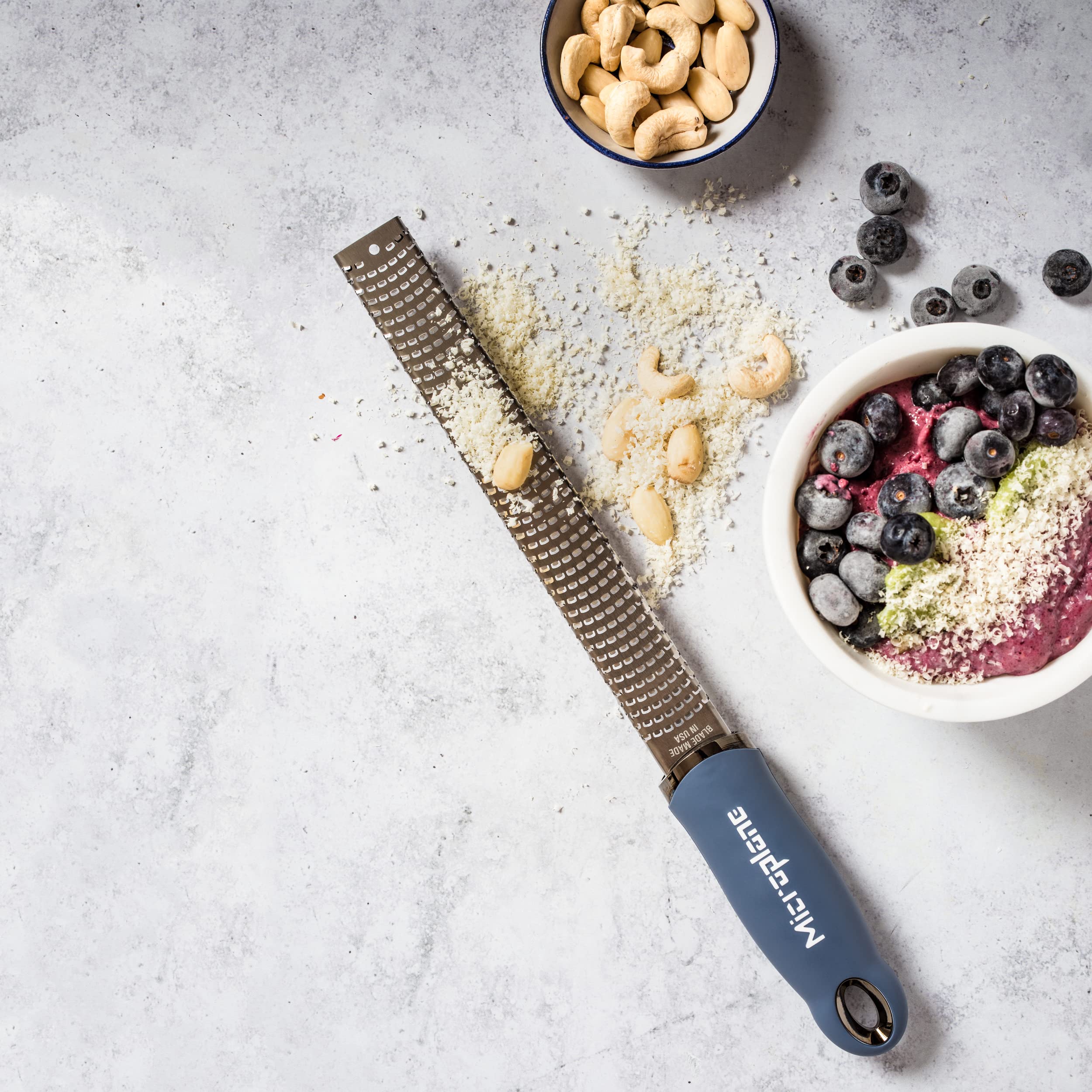 Microplane Premium Zester Grater in Denim Blue | Lemon Zester tool, Hard Cheese & Vegetable Grater | For Citrus, Parmesan Cheese, Garlic, Ginger, Nutmeg | Fine Stainless Steel Blade, Made in USA